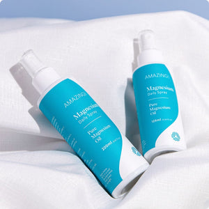 125ml & 200ml Daily Magnesium Spray on white blanket